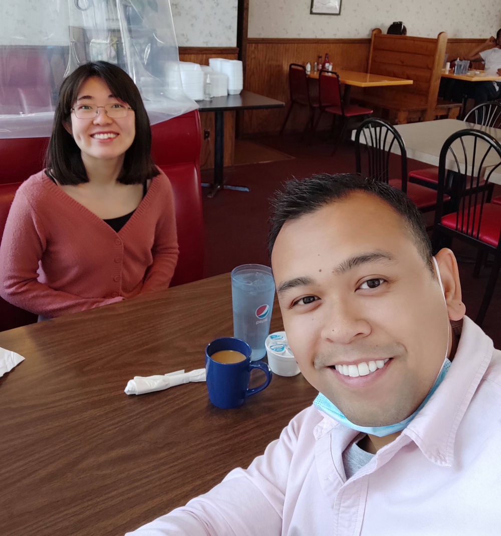 "Tim and Dianyi eating at Belleville Pancake House"